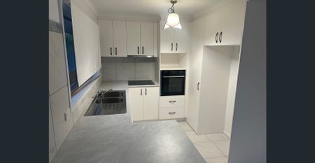 Charming 4-Bedroom Home in Prime North Shepparton Location! - Photo 4