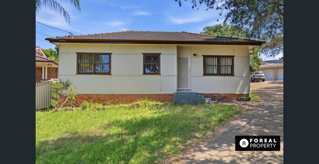 Charming 3-Bedroom Home with Easy Living & Great Location - Photo 1