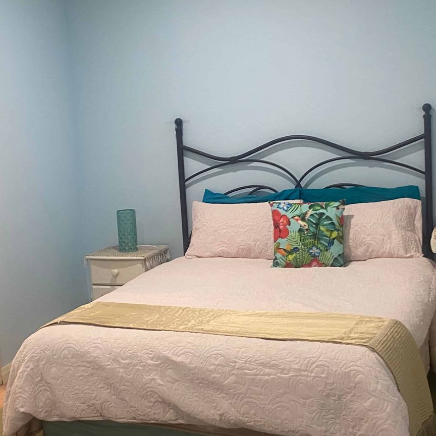 Unit under the house with private backyard - Photo 1