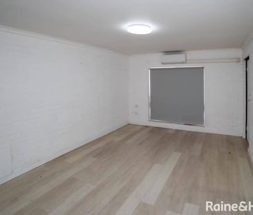 CONVIENENT LOW-KEY LIVING - Photo 6