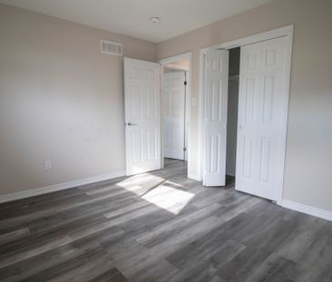 **CHARMING AND SPACIOUS** 3-Bedroom Upper Unit in Welland - Photo 2