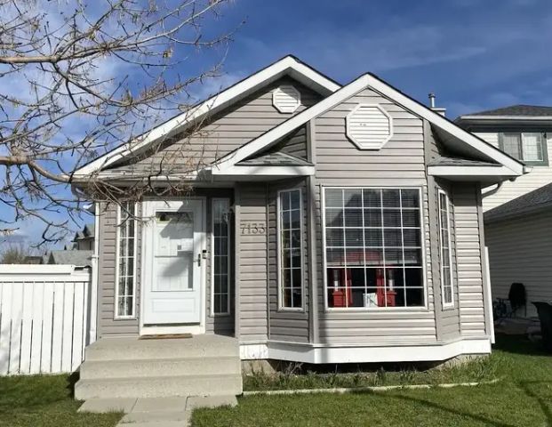 2 bedroom, 1 Bath, Fire place renovated 4 level split house basement, Corner Lot | 7133 Laguna Way NE, Calgary - Photo 1