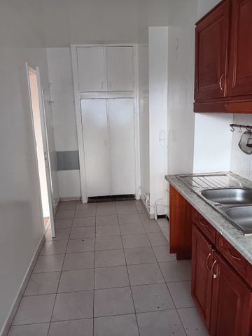 APPARTEMENT 3 PIECES 60.53 M² AVEC CAVE ET PARKING EN SOUS-SOL - Photo 4