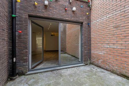 Lichtrijk gelijkvloers appartement met terras op toplocatie! - Photo 3