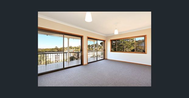 Light-Filled Apartment Offering Comfort and Convenience - Photo 1