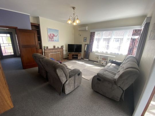 Bright 2-Bedroom Home in Wakari - Photo 1