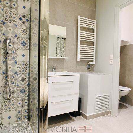 CENTRE VILLE - 2P NEUF AVEC JARDIN - Photo 3