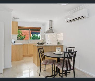 Well-Maintained Two-Bedroom Unit - Photo 3