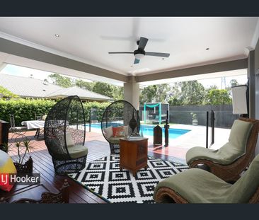 MAGNIFICENT FAMILY HOME WITH LUXURY FINISHES & RESORT-STYLE POOL - Photo 1