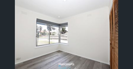 Spacious 3-Bedroom Home with Natural Light and Modern Amenities - Photo 4