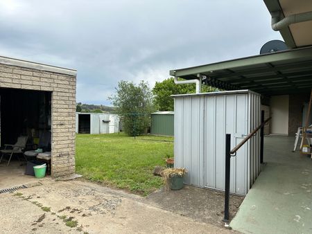 Neat and Tidy Home + Large backyard - Photo 5