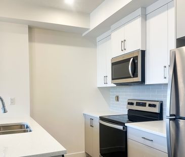 1 Bed Condo In Springbank Hill | Heat & Water Included | Undergroun... - Photo 4