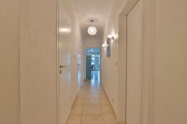 Rustig gelegen, ruim dakappartement met 2 slaapkamers nabij Cortewalle! - Photo 1