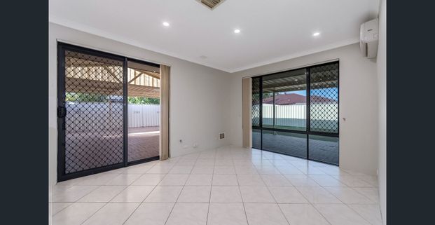 SPACIOUS FAMILY HOME WITH MULTIPLE LIVING AREAS & SOLAR - Photo 1