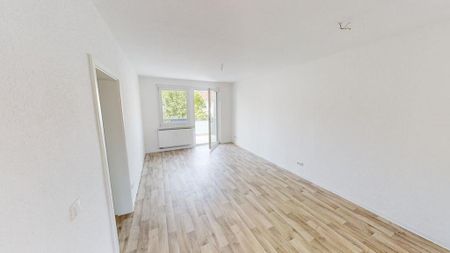 Attraktive 3-Raum-Wohnung mit Einbauküche - Foto 2