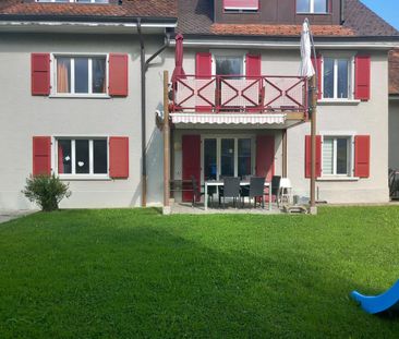 Appartement de 5,5 pièces rez-de-chaussée avec terrasse - Photo 2