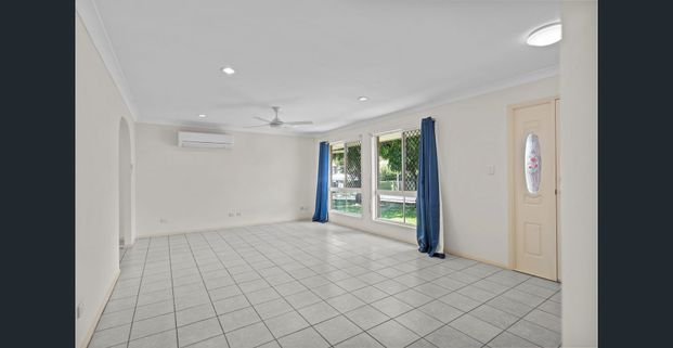 Fresh, Spacious and Family Friendly Living in a Super Convenient Location - Photo 1