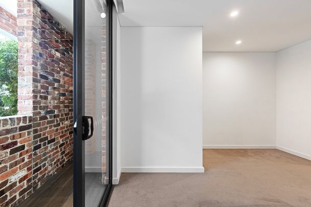 Split-Level I Courtyard Apartment I Lockup Garage - Photo 1