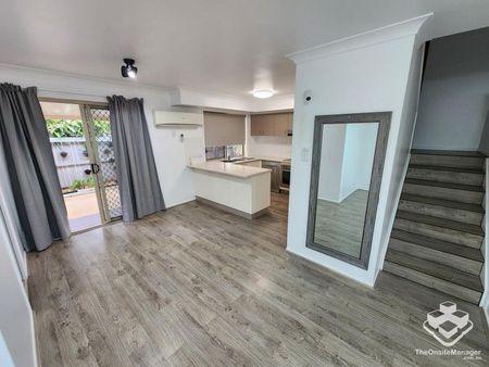 Double Garage, Air-Conditioned and wooden flooring throughout! - Photo 5