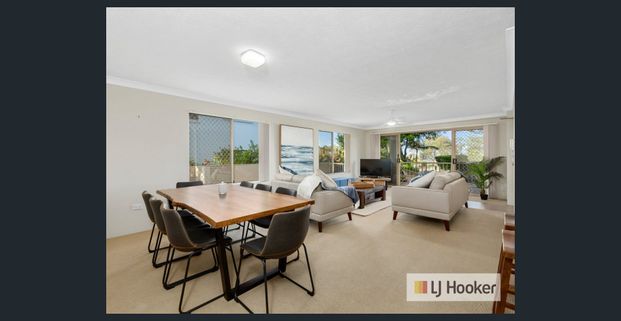 BEACHISIDE LIVING! FULLY FURNISHED GROUND FLOOR UNIT - Photo 1