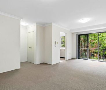 Sundrenched and Secure 1-Bedroom Apartment in a Prime Location - Photo 1