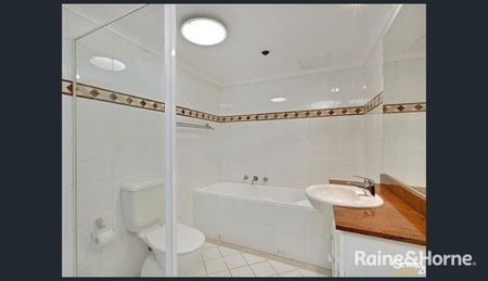 Modern 1 Bedroom Apartment with Parking in Prime CBD Location - Photo 2