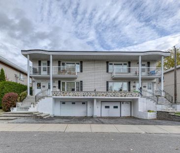 Très grand 3 1/2 , au demi-sous-sol d'un duplex dans emplacement tr... - Photo 2