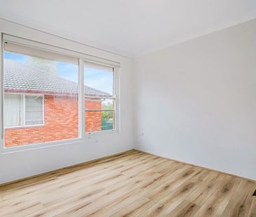 Sun Filled, Freshly Painted Two Bedroom Apartment - Photo 1