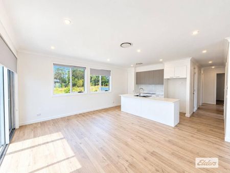 Near New, Architecturally Designed Villa with Spacious Yard - Photo 5