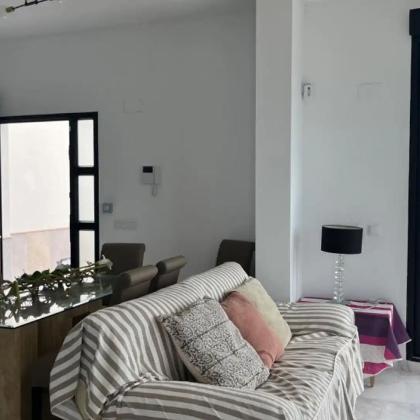 Casa adosada de alquiler en Carrer Azahar, 1, El Faro - Photo 1