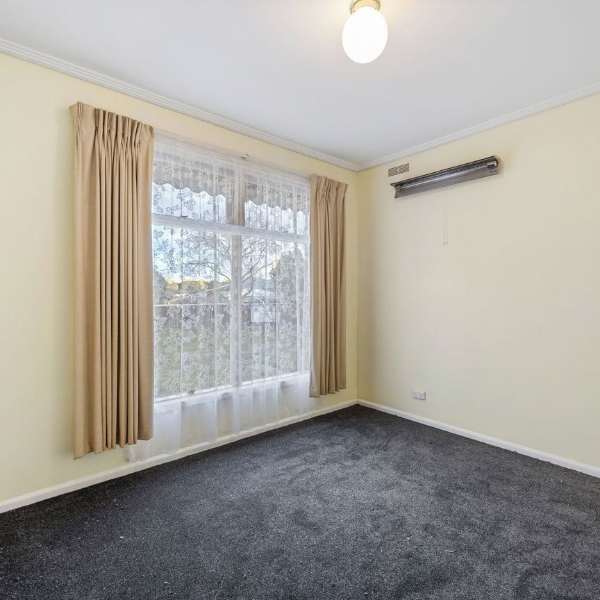 Well Positioned Home with Spacious Yard - Photo 1