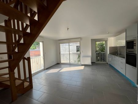 Appartement à louer - Photo 2