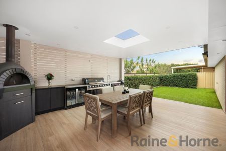 9 Laurieton Road, Carnes Hill, NSW 2171 - Photo 5