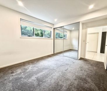 Modern 3-Bedroom Townhouse in a Great Location - Photo 1