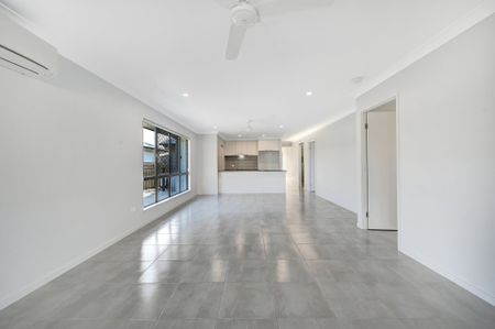 Modern Family Home with Pool in Prime Mount Low Location - Photo 2