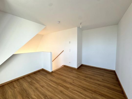 2 Zimmer Dachgeschoss Wohnung mit luftigem Raumgefühl - Erstbezug - Unbefristet - Photo 1