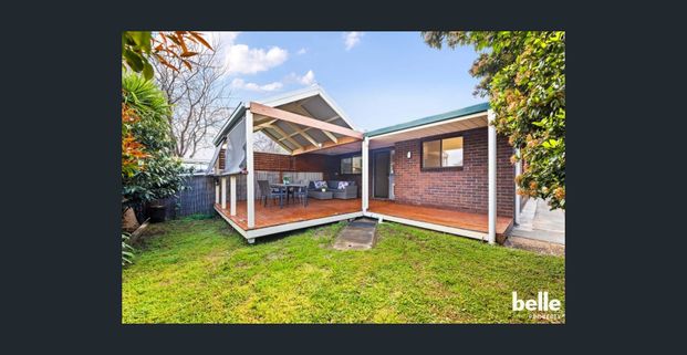 Modern 2-Bedroom Unit with Low-Maintenance Yard - Photo 1