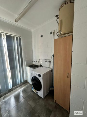 Modern & Convenient 2-Bedroom Unit in the Heart of Town - Photo 2