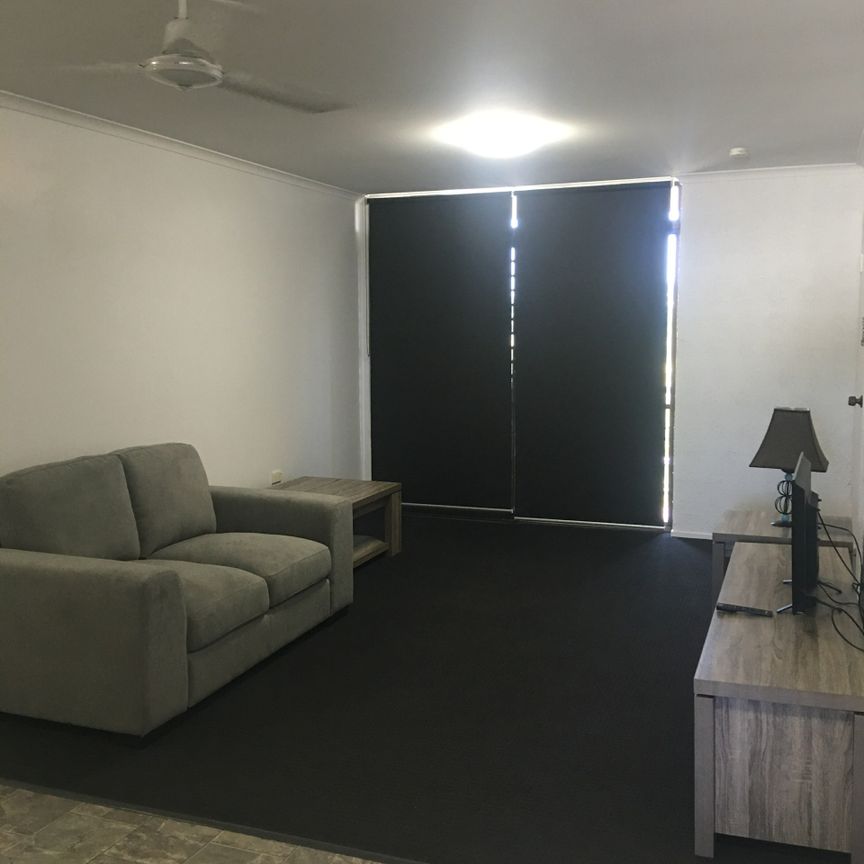 Furnished Top Floor Unit! - Photo 1