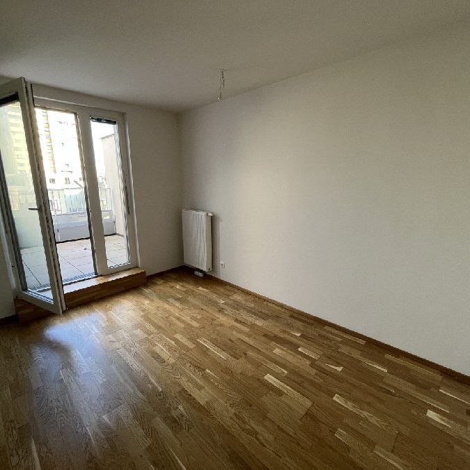 Moderne 1-Zimmer-Wohnung mit Dachterrasse - Foto 1