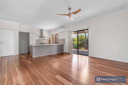 IMMACULATE AND WELL APPOINTED THREE BEDROOM HOME - Photo 3