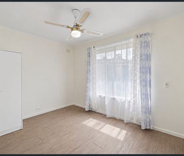 Comfortable Three-Bedroom Home with Gardens and Outdoor Entertaining - Photo 2