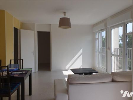 REIMS - RUE DE TAISSY - Appartement de type F4 - 68m² avec parking privé et cave - Photo 3