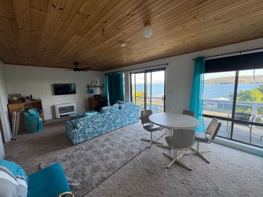 Fully Furnished Coastal Retreat in Primrose Sands - Photo 1