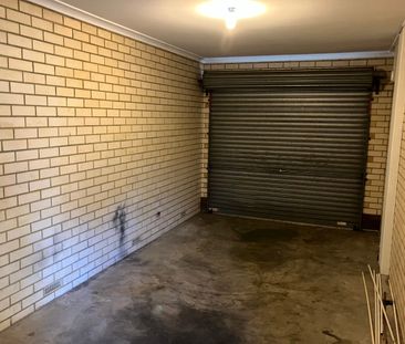 Two bedroom unit with secure garage and air conditioning - Photo 6