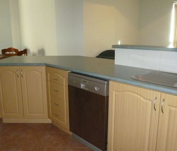 JUST A SHORT WALK TO THE BEACH OR SHOPS - Photo 4