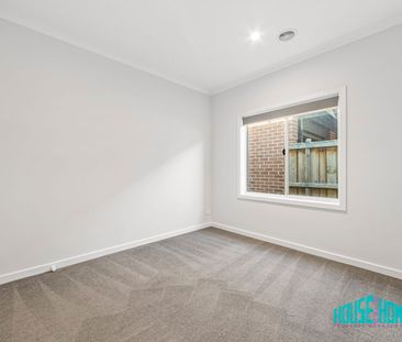 Stylish Four-Bedroom Family Home with Space, Comfort and Convenience - Photo 4