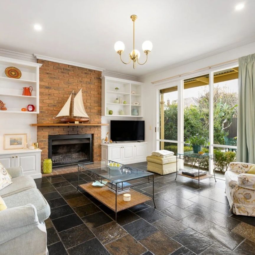 CHARMING VICTORIAN-INSPIRED HOME IN A BRIGHT, LOW MAINTENANCE GARDEN SETTING! - Photo 1