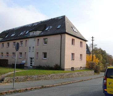 Familienfreundliche Dachwohnung direkt im Grünen zwischen Schule un... - Foto 1