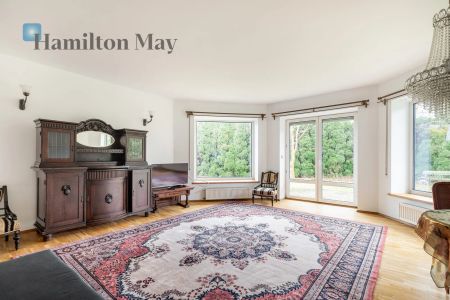 Nietuzinkowy dom na wynajem z przestronnym i zadbanym ogrodem na Woli Justowskiej - Zdjęcie 3